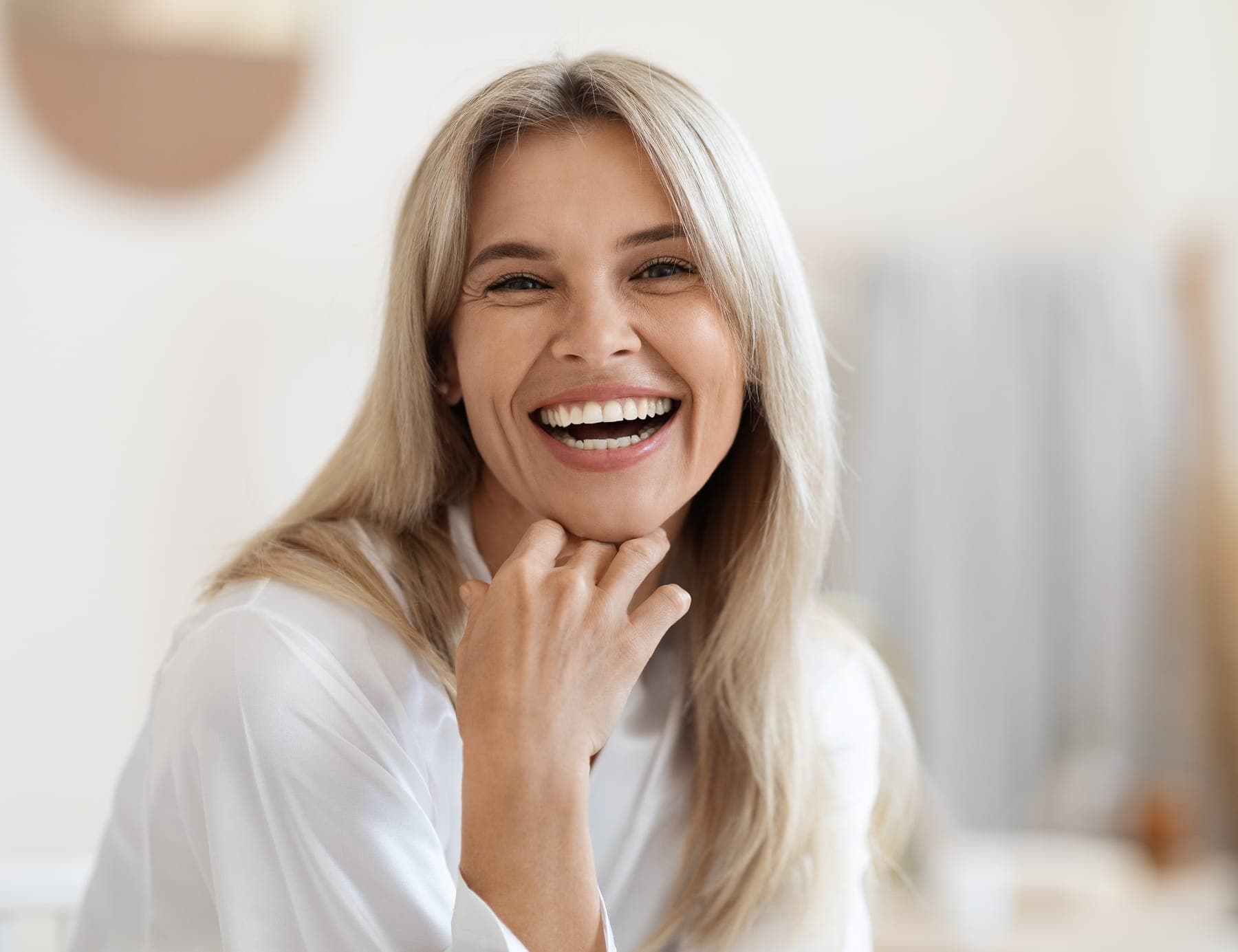 Smiling woman with natural skin