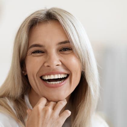 Smiling woman with natural skin