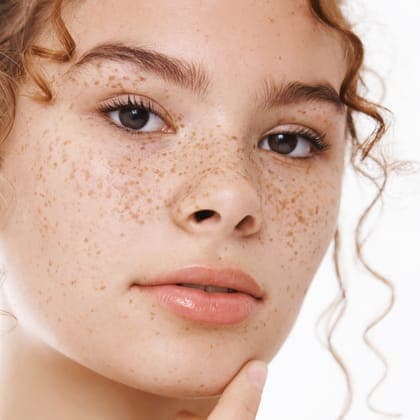 Portrait of a young woman with natural skin