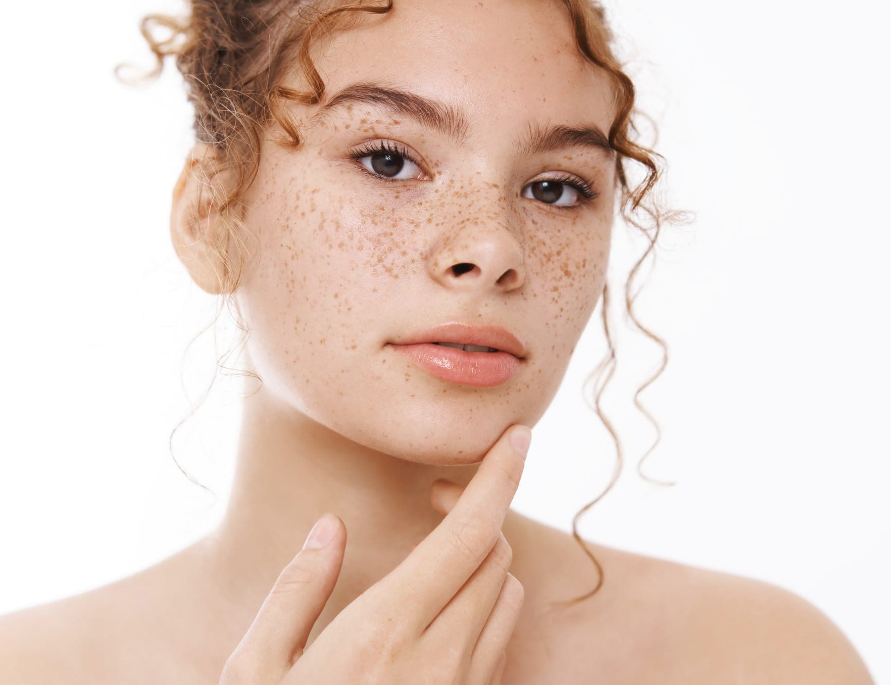 Portrait of a young woman with natural skin