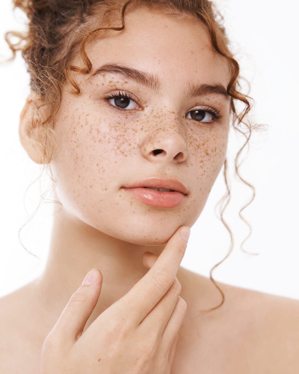 Portrait of a young woman with natural skin